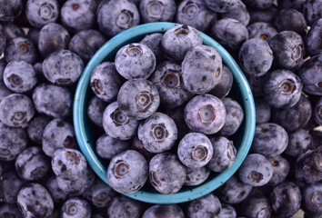 Background of blueberries. A lot of blueberries, top view.