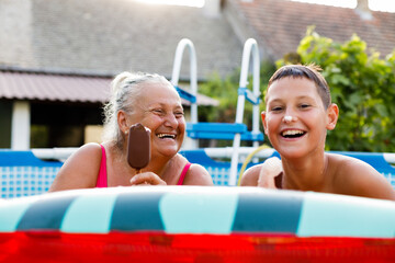 A family having fun in the swimming pool