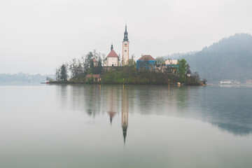 Various photos taken around lake bled in slovenia on a rainy cloudy and foggy day
