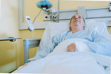Male patient after injury or surgery in hospital ward