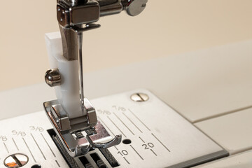 Close-up of sewing machine presser foot