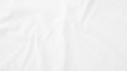 Fototapeta premium Organic Fabric cotton backdrop White linen canvas crumpled natural cotton fabric Natural handmade linen top view background organic Eco textiles White Fabric linen texture