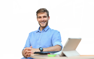 Portrait of happy man sitting at office desk, looking at camera, smiling on a transparent background