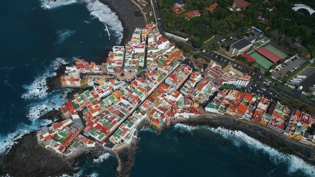 blue water ocean shore, small cozy village Punta Brava, Tenerife, Canary aerial