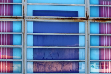 Abstract fragment of modern architecture, glass and concrete walls.