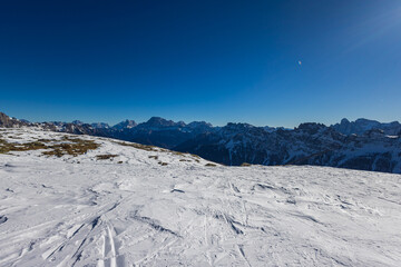 Beautiful alpine panoramic view of snowy mountains, beautiful European winter mountains in Italy...