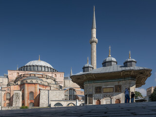 Fototapeta na wymiar Sultan Ahmed III fountain pavilion in front of Hagia Sophia ancient mosque, Istanbul, Türkiye