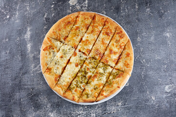 tasty pizza on the dark background