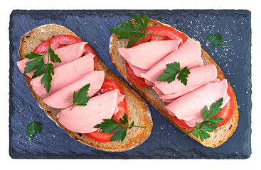 Mortadella sandwiches on black slate board. View from above. Homemade meal for fast. - 630083271