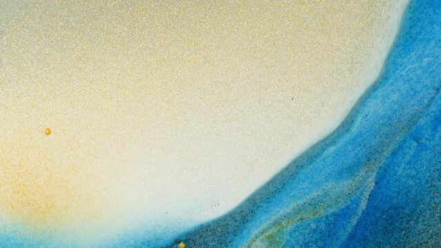 Multi colored sand texture, macro close up colourful background with pouring falling sand and water.