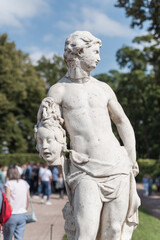 An ancient stone statue in the garden of the Catherine Palace in Tsarskoe Selo (Pushkin) close-up.