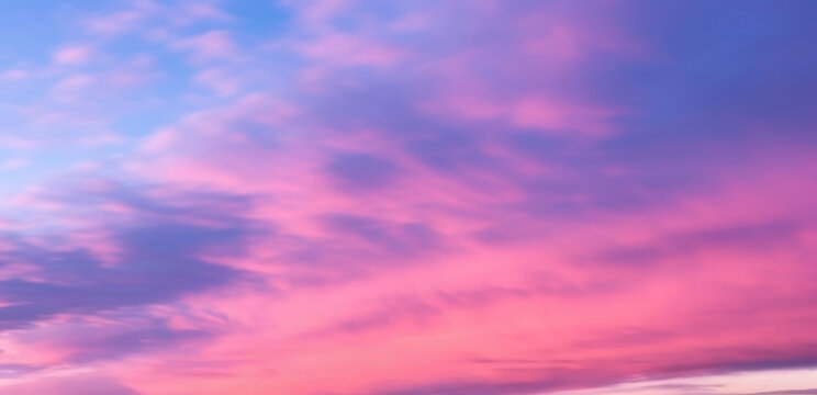 Great sunset sky with clouds all possible shades of pink and purple, great nature background.