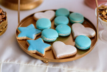 Delicious sweets in blue tones on candy bar.  