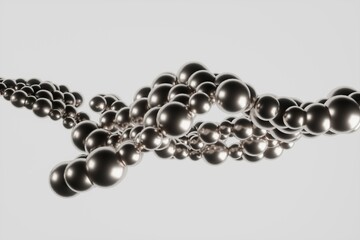 Silver shiny metal balls on grey background