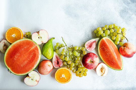 Seasonal fruit frame on white surface