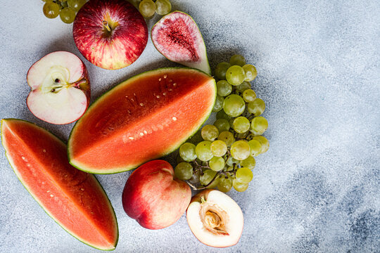 Seasonal fruit frame on white surface