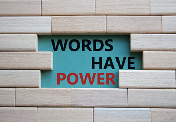 Words have power symbol. Wooden blocks with words Words have power. Beautiful grey green...