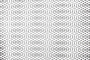 Empty white (light gray) perforated metal grid with circular holes for abstract  horizontal...