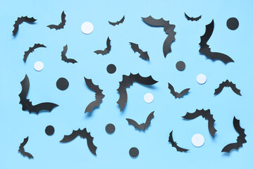 Paper bats for Halloween party on blue background