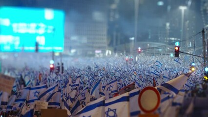 Thousands of people wave Israeli flags during demonstrations