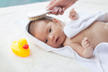 Cute little baby after shower.