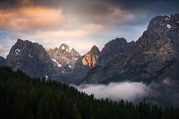 Beautiful mountain landscape in the Dolomites, Italy. Beautifully lit mountain peaks in the morning or sunset.

