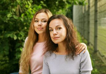 Fototapeta premium Mother With Adult Daughter In Park Together.