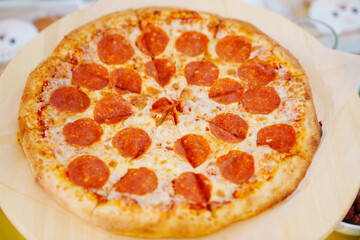 slices of pepperoni pizza. Italian cuisine.
