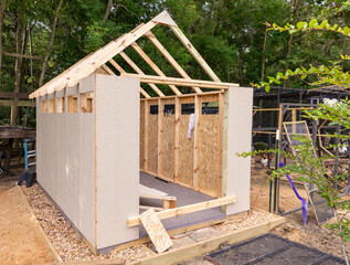 Storage shed being built in back yard
