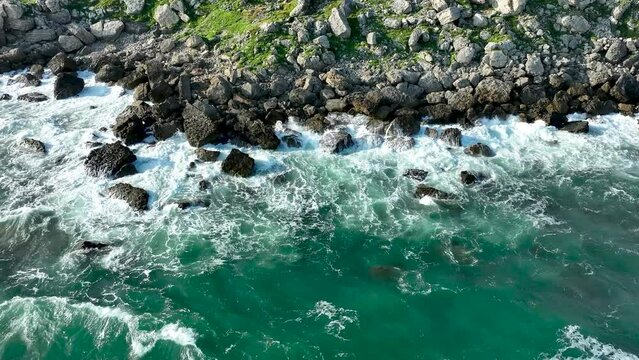 Valley of stones. Atlantic Ocean beach. England, Dorset. Cinematic drone flight