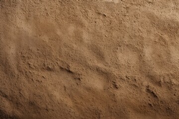 Gritty sandpaper texture background. Abrasive and rough sanding surface, beige and brown hues, gritty and raw.
