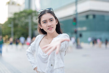 A bossy young woman demands an explanation, getting impatient with someone. A domineering, entitled...
