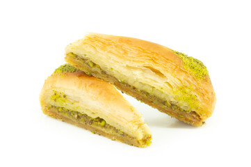 Traditional turkish dessert carrrot slice antep baklava with pistachio isolated on white background. Desserts concept