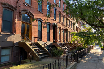 Hoboken, NJ, USA, brownstone entrance, facade of the building, staircase leading to the door