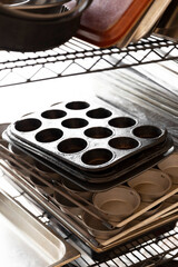Muffin Trays Stacked on top of Commercial Kitchen Storage System