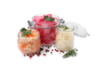 Delicious sauerkraut prepared according to different recipes and spices on white background
