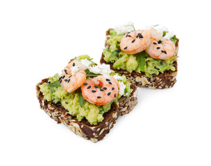 Delicious sandwiches with guacamole, shrimps and black sesame seeds on white background