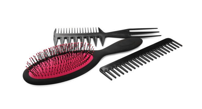 Set of hair brush and combs isolated on white