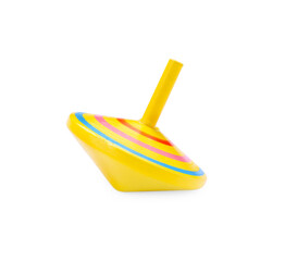 One bright spinning top isolated on white. Toy whirligig