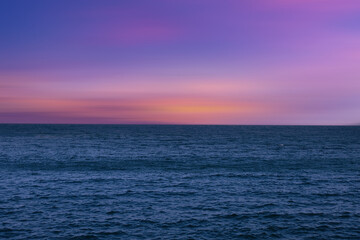 Naklejka na ściany i meble Sea ocean and cloudy sky background. sunset.