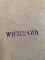 Withdrawn stamp in purple ink
