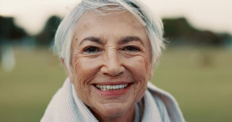 Face, senior woman and smile in nature on vacation, holiday or travel in winter. Portrait, happy and elderly person in the countryside, park or garden for wellness, freedom or retirement in Canada