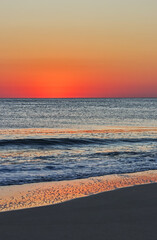 The ocean and land moments before sunrise - Outer banks, NC, USA