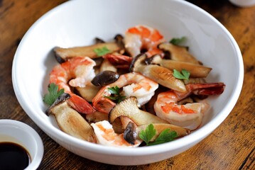 Fried king oyster mushrooms with tiger prawns