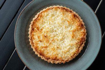 Keto coconut tart. Erythritol is used instead of sugar, and the tart crust is made with almond flour and coconut flour