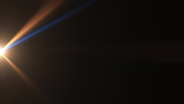 Abstract gold blue optical lens flares shine light burst motion animation moving to left side on black background for screen project overlay. 4K seamless loop dynamic kinetic bright star light rays ef