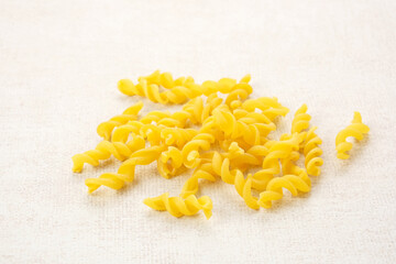 Raw Macaroni pasta served on the table
