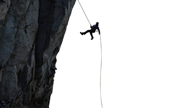 Adventure man rappel down a mountain cliff. PNG cutout. 3d rendering rock cliff. composite