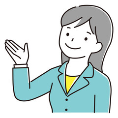 笑顔で案内をするスーツ姿の若い女性