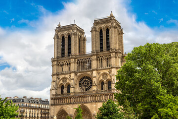 Fototapeta na wymiar Notre Dame de Paris is the one of the most famous symbols of Paris in a summer day, France